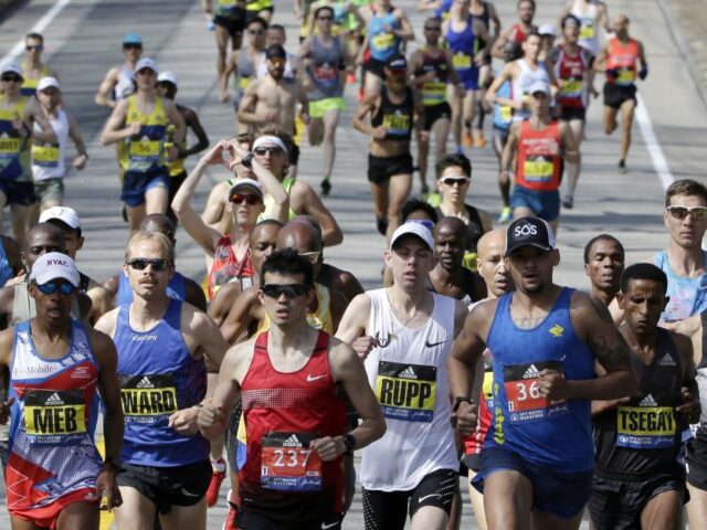 Elite men runners lead the field in the 121st Boston Marathon on Monday, April 17, 2017, in Hopkinton, Mass. (AP Photo/Steven Senne)